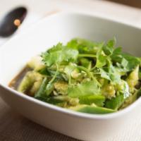 Cucumber Salad W. Garlic Sauce · Contains cilantro and garlic.