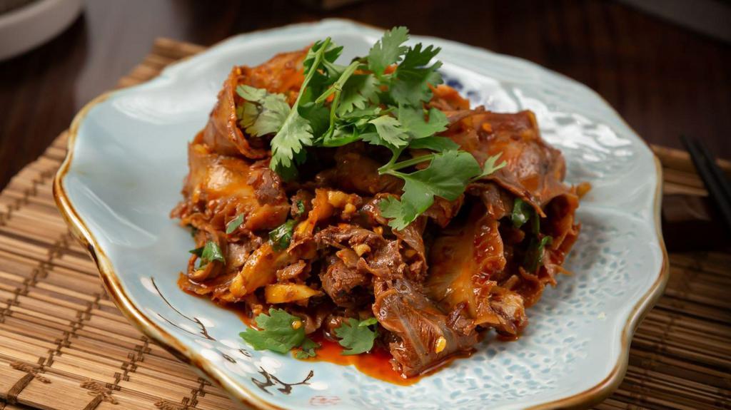 Ox Tongue Tripe W. Spicy Peppery Sauce · Beef Tongue tripe Contains fresh garlic,cilantro,peanuts.