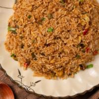 Fried Rice Hunan Style · Contains preserved pork and sour string beans and hot red peppers.