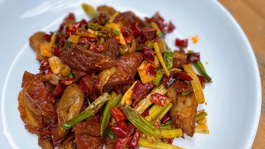 Crispy Pork Intestine · Crispy Pork Intestine with dry red peppers.