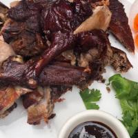 Smoked Tea Duck · Half a duck.Hoi sin sauce on the side.