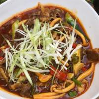Braised Slice Beef · Sliced Beef with sour string bean ,mushrooms and red&green peppers.