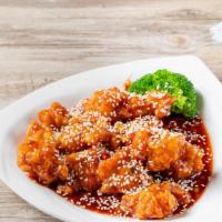 Sesame Chicken · deep fried chunk white meat and a few steamed broccoli, sesame seed w. sweet sour sauce