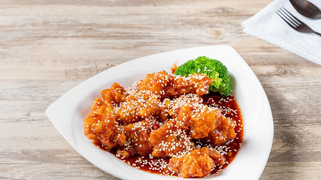Sesame Chicken · deep fried chunk white meat and a few steamed broccoli, sesame seed w. sweet sour sauce