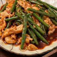 Chicken W. String Beans · sauteed sliced white meat and string beans w. brown sauce