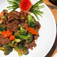 Beef W. Broccoli · sauteed sliced beef and broccoli w. brown sauce