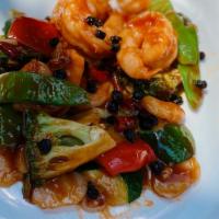 Jumbo Shrimps Hunan Style · sauteed prawns and broccoli, snow peas, green pepper, luffa, water chestnut w. spicy black b...