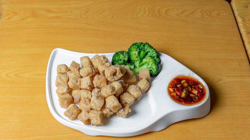 General Tso' S Tofu · deep fried tofu and a few steamed broccoli w. sweet sour spicy sauce