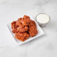 Boneless Buffalo Wings · Tossed in your choice of sauce and served with bleu cheese dressing on the side.