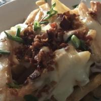 Irish Nachos · Crispy fries with bacon, scallions, melted mozzarella.