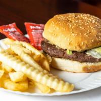 Cheeseburger · 8 oz. 100% beef cowboy burger stuffed with cheese, lettuce, pickle, tomato, mayo, and ketchup.