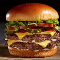 Manhattan Burger · Delicious 1/2 lb Fresh Angus Burger, Lettuce, Tomato, Onions, Pickles, Mayo, Ketchup, Cheese.