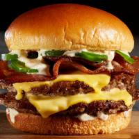 Helll'S Kitchen Burger · 1/2 Lb Angus Beef Patty, Jalapeno Ranch Sauce, Jalapeno Peppers, Jalapeno Bacon and Cheese. ...