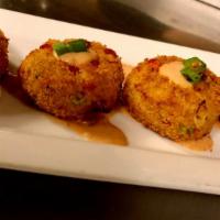 Fresh Maryland Crab Cakes · fresh maryland crab lightly dressed with red bell peppers, celery and onion served with remo...