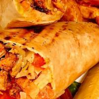 Blackened Chicken Wrap · blackened chicken wrapped in a flour toritlla with  bacon, lettuce, tomato, cheddar cheese a...
