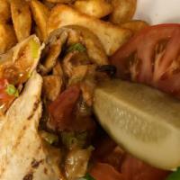 Buffalo Chicken Wrap · spicy buffalo chicken wrapped in a flour toritlla with lettuce, tomato, cheddar cheese, bleu...