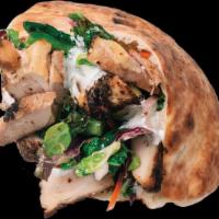 Street Pita · Fresh baked pita stuffed with saffron rice and your choice of main, toppings and sauce