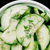 Dill Cucumbers · Fresh cucumbers mixed with dill and red wine vinegar