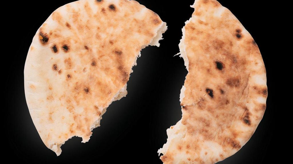 Extra Pita · Extra side of warm baked, pita bread. Note: pita is available at no cost as a side to a rice plate or salad entree - be sure to add when building your dish!