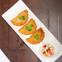 A5 Vegetable Curry Puff · Pastry filled with potatoes, onions, kabocha, string beans, peas, carrots with curry seasoni...