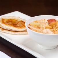 A12 Roti Served With Massaman Curry · Grilled flatbread with massaman curry.