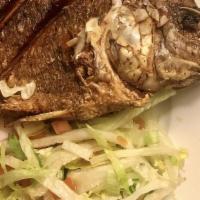 Mojarra Frita · Fried red tilapia. Served with rice and beans or green salad, bread or tortilla.