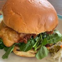 Fried Fish Sandwich · Fresh Fish in Epis-Infused Beer Batter with Watercress, Pikliz with Herb May on a Roll