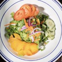 House Salad · Market Vegetables and Greens in a Citrus Vinaigrette