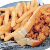 Fresh Fried Clam Strip Roll And Chips · Fried fresh clam strips in a hot dog roll, french fries, tarter sauce
