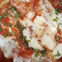 Eggplant Rollatini · Rolled and stuffed with fresh ricotta and finished with tomato sauce and fresh buffalo mozza...