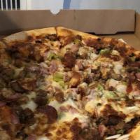Chicago Pan Pizza (Large) · Pepperoni, sausage, ham, green peppers, onions, and mushrooms.