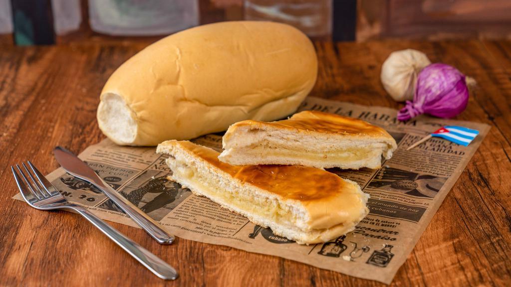 Pan Con Mantequilla O Tostada  / Cuban Bread And Butter Sandwich · Pan cubano tostado con Mantequilla / Hot pressed Cuban bread with REAL Butter