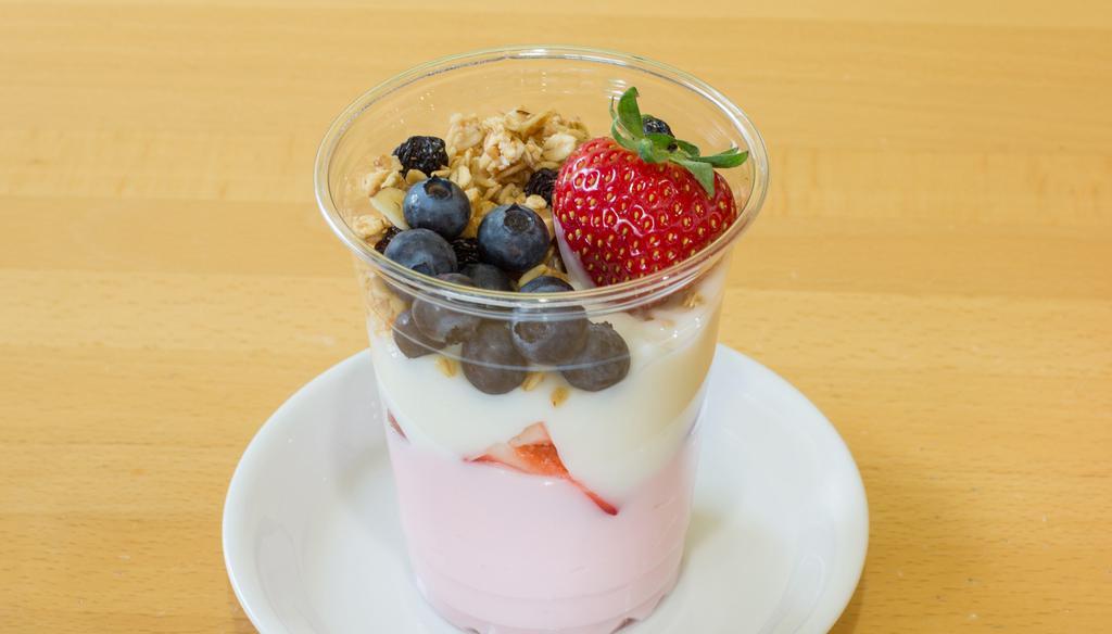 Strawberry Yogurt Parfait · Strawberry & vanilla yogurt, with fresh cut strawberries, blueberries, and granola!