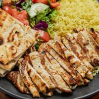 Grilled Chicken Breast · Grilled boneless chicken breast served with yellow rice or fries, mix greens. tomatoes and a...
