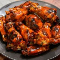 Grilled Buffalo Wings · Choice of Naked / BBQ / Buffalo / Blue Cheese.