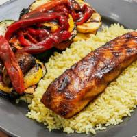 Salmon Fillet · Served with grilled vegetables, rice and a side pita bread.