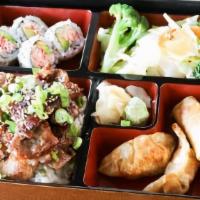 Chicken & Beef Bento · Bento box featuring your choice of teriyaki comes with four pieces of California roll, two p...