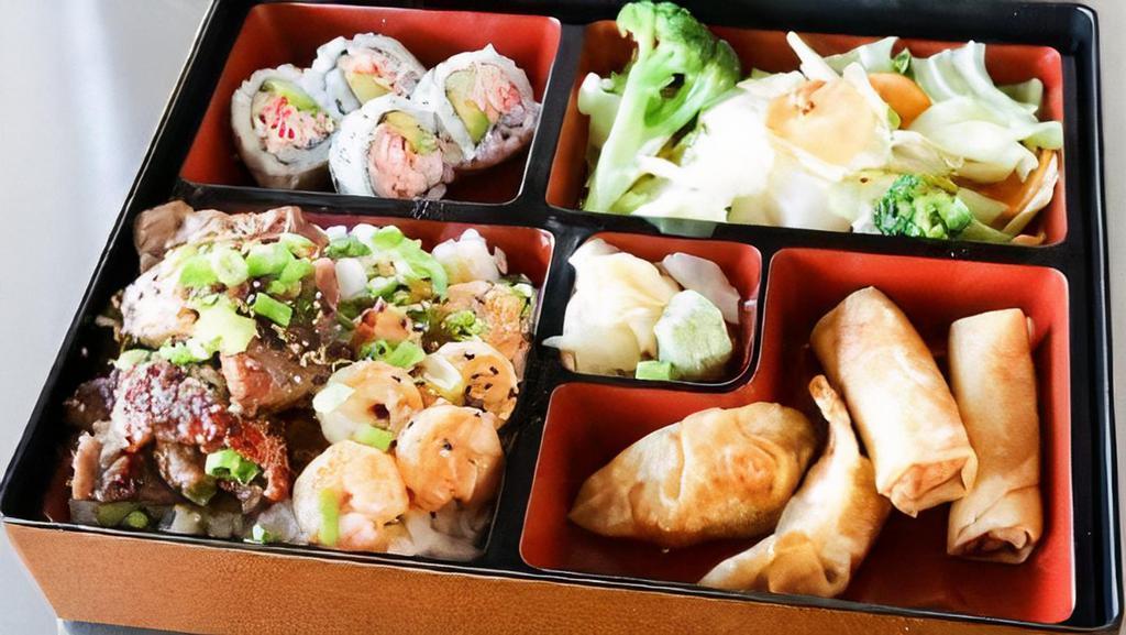 Beef & Shrimp Bento · Bento box featuring your choice of teriyaki comes with four pieces of California roll, two pieces of chicken dumpling, two pieces of spring roll. Choose two sides white rice, fried rice, noodles, and mixed vegetables.