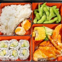 Salmon Teriyaki Lunch Box · served w. california roll, shumai, edamame, rice, miso soup &salad