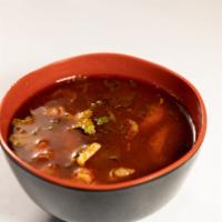 Tom Yum Koong · Thai spicy & sour soup with shrimp, lemongrass, mushroom, pepper & lime juice