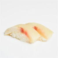 Yellowtail Nigiri · Two pieces of yellowtail over pressed sushi rice.