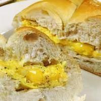Eggs With Cheese · 2 Eggs Any Style w/Choice of Cheese on Wheat/White Roll.