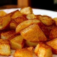 Home Fries · Grill-fried potatoes cut into small cubes or slices, fried in butter with onions, peppers, a...