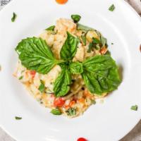 Shrimp Risotto · Shrimps, cherry tomatoes, green zucchini and Parmesan cheese.
