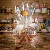 Cc-1.00 · Edible chocolate basket containing approximately 8-10 pretzels.

Net weight approximately 1 ...
