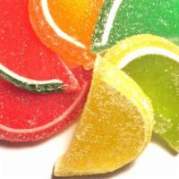 Fruit Jelly Slices · Sugar-dusted fruit flavored candies in neon-bright colors and fruity flavors. Moist, chewy a...