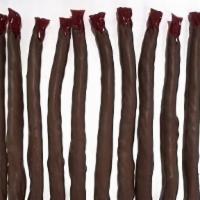 Chocolate Dipped Licorice · Strawberry or black licorice sticks dipped in milk or dark chocolate.
