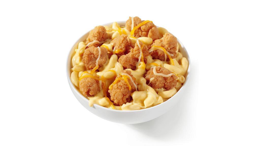 Mac & Cheese Bowl · Bowl of Mac & Cheese, topped with chicken, and three-cheese blend (840-1120 cal.)