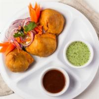  Vegetable Samosa · Fried pastry with savory filling (spiced potato, chickpeas, and onion). Vegetarian.