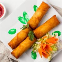 Spring Roll · Mix vegetables stir-fried and wrapped in phyllo sheet and crispy fried. Vegetarian.